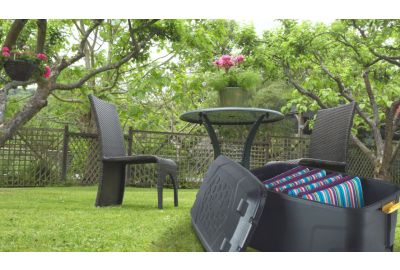 Garden chairs in a picturesque garden.