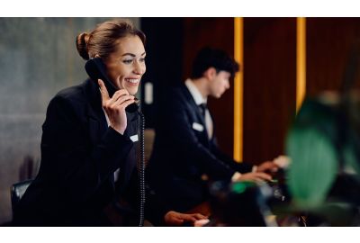 Receptionist on the phone.