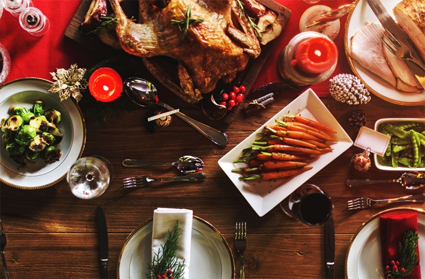 A Christmas dinner placed on a table.