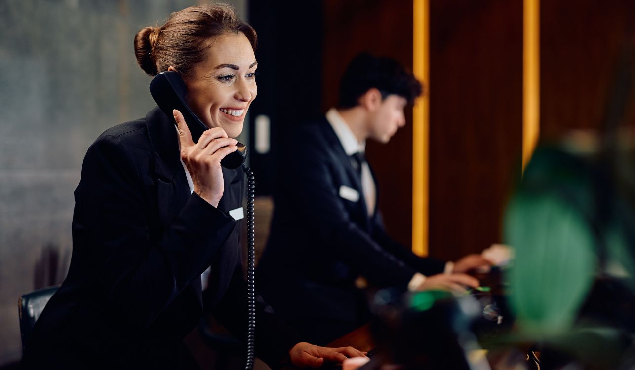 Receptionist on the phone.