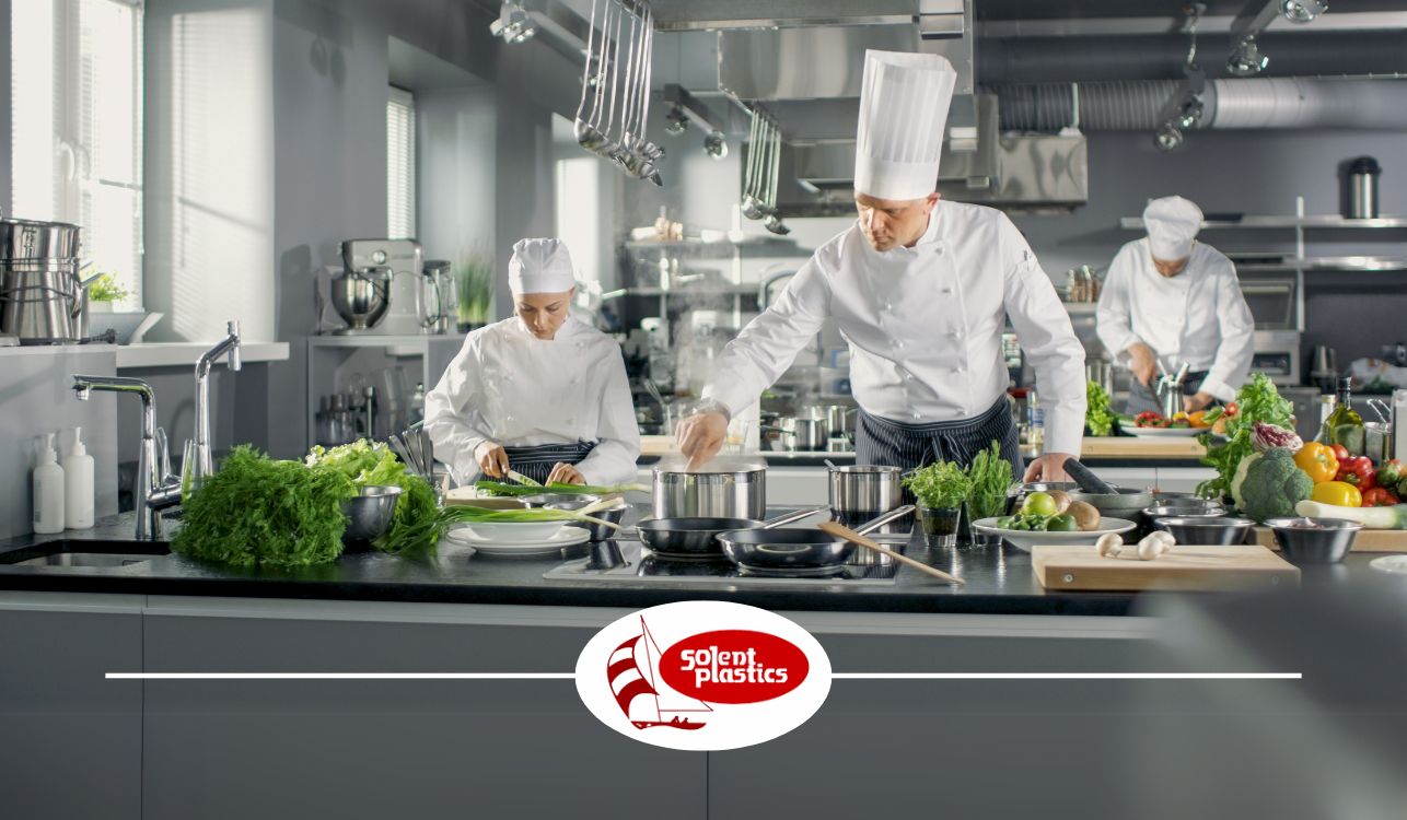 Image of kitchen staff working.